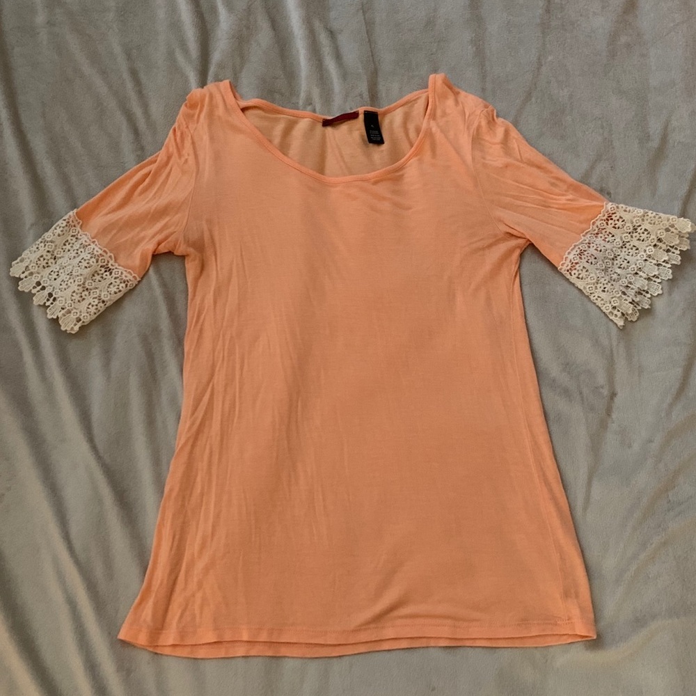 Peach blouse with lace sleeves